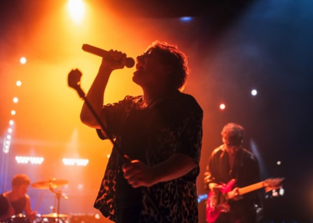A band playing on stage.