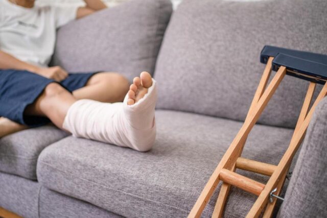 A person with a cast on their leg.